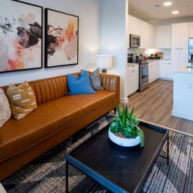 Beautiful living areas to match your lifestyle a living room with a couch and a coffee table