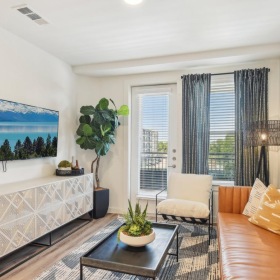 Beautiful living areas to match your lifestyle a living room with a couch and a coffee table