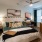 a bedroom with a bed and a desk