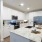 a kitchen with white cabinets