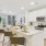 a kitchen with white cabinets