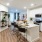 a kitchen with white cabinets